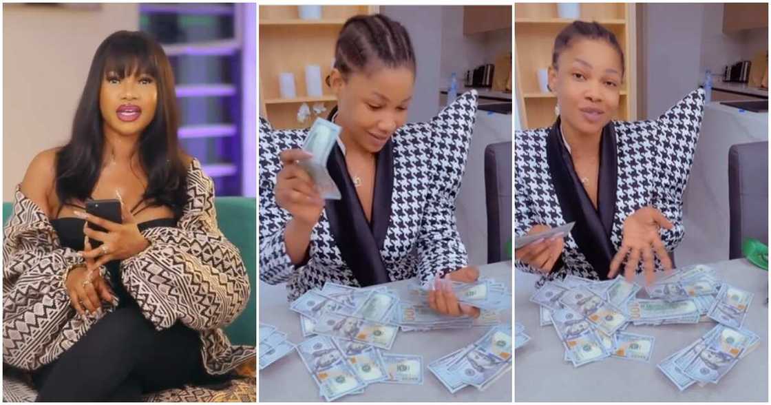 Photos of BBNaija star Tacha flaunting dollar bills