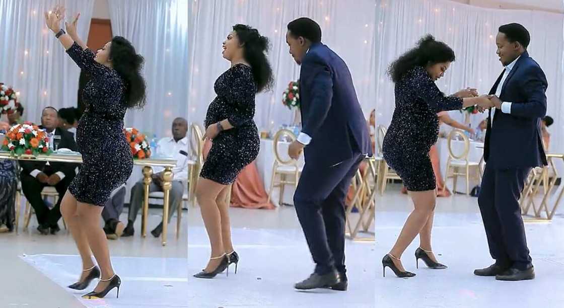 Photos of a pregnant woman dancing with man. Photos of a pregnant woman dancing with man.