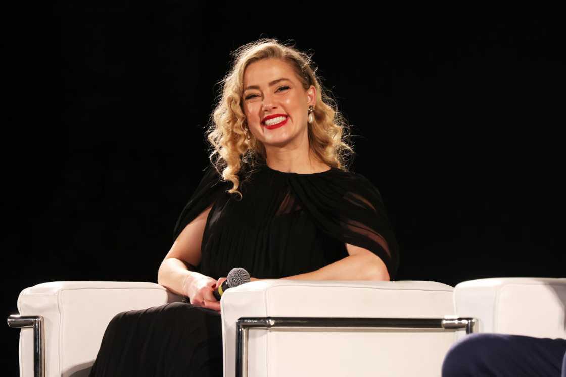 Amber Heard speaks during an event in Italy