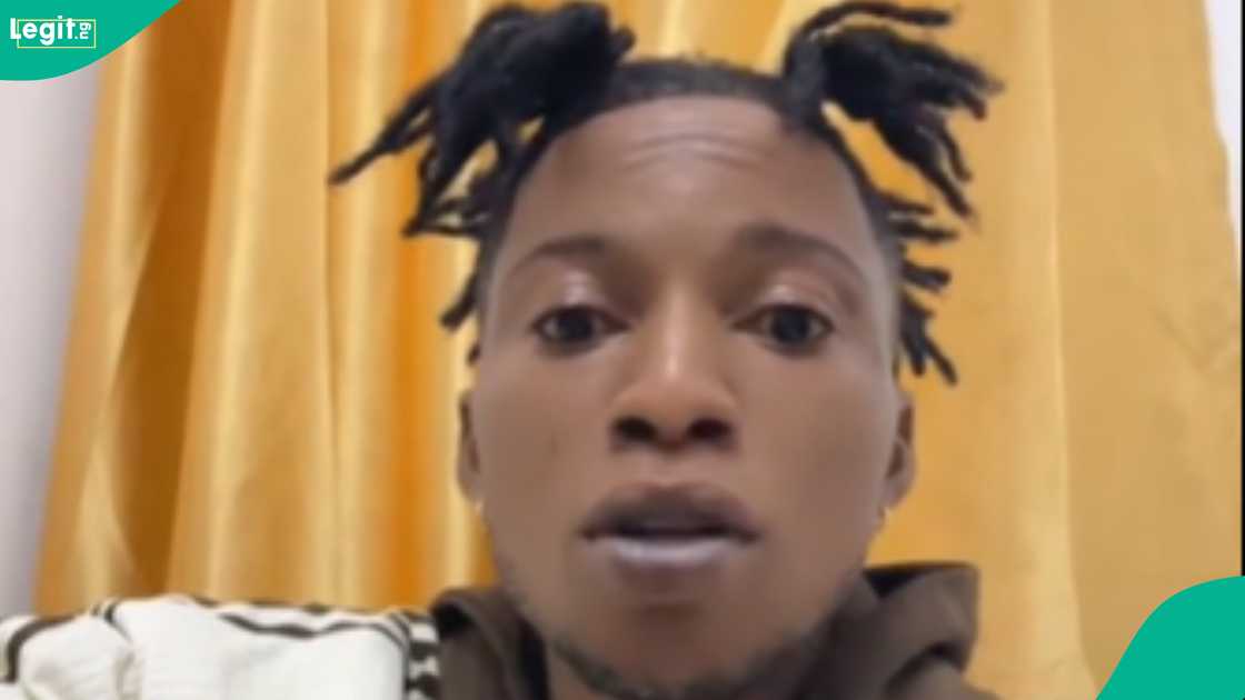 A man expresses surprise as all passengers slept inside the bus. A man expresses surprise as all passengers slept inside the bus.