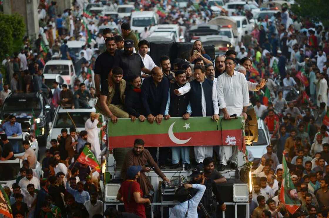 Former Pakistan prime minister Imran Khan and senior aides aboard a bus during a protest against rising prices in Rawalpindi in early July Former Pakistan prime minister Imran Khan and senior aides aboard a bus during a protest against rising prices in Rawalpindi in early July