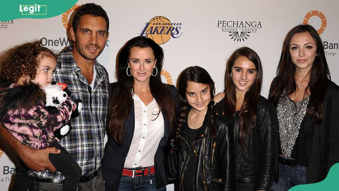 Kyle and Mauricio with daughters Portia, Sophia, Alexia and Farrah Aldjufrie attending the Lakers casino night