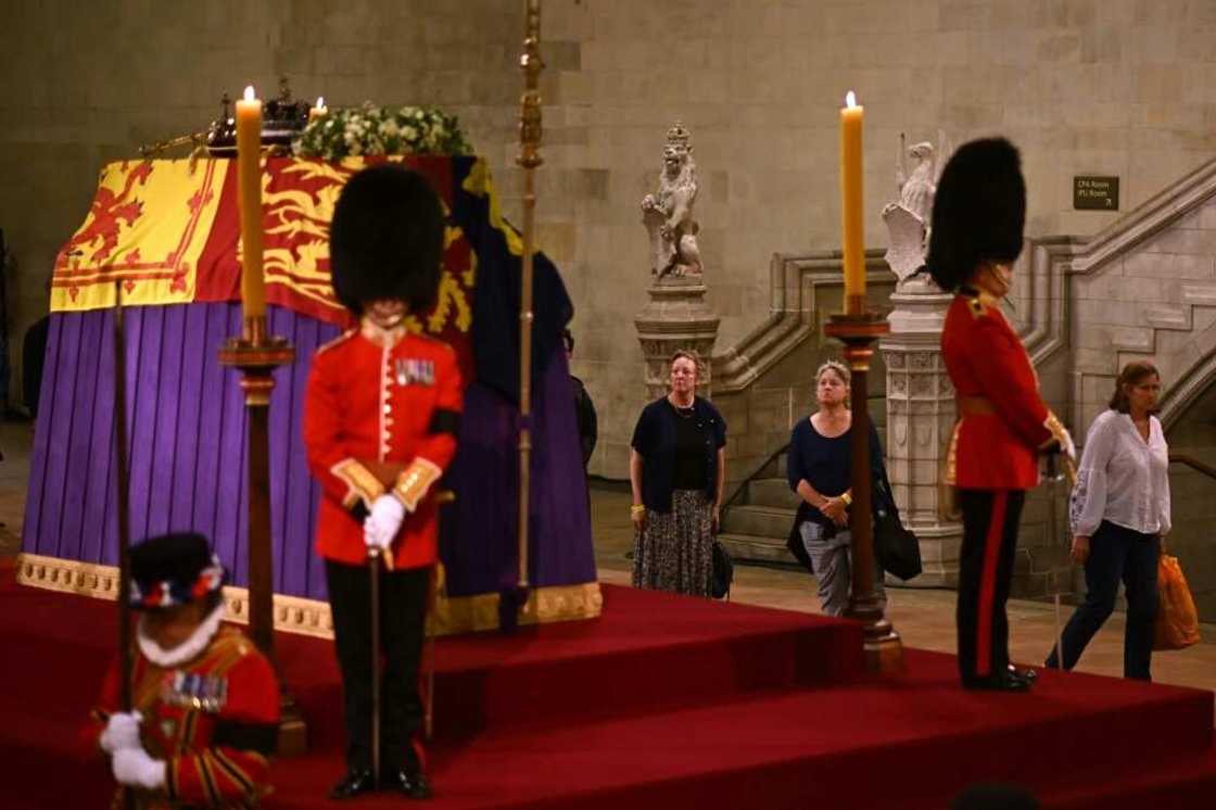 The first public mourners were allowed into the vast medieval Westminster Hall on Wednesday The first public mourners were allowed into the vast medieval Westminster Hall on Wednesday