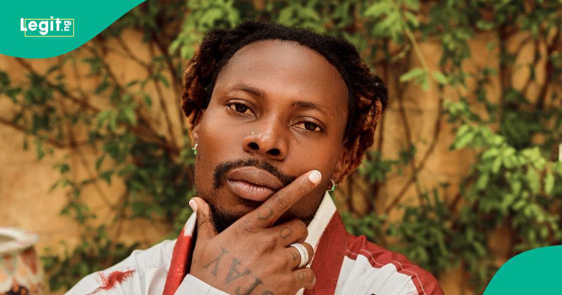 Asake shares new pictures as he gets tattoo.