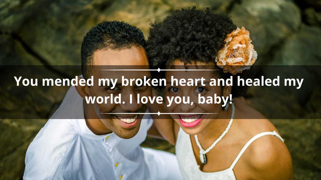 A happy couple in white outfits is captured looking into the sky A happy couple in white outfits is captured looking into the sky