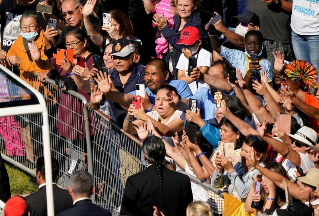 Catholic faithful take pictures and cheer as Pope Francis arrives at the shrine of Sainte-Anne-de-Beaupre in Quebec, Canada on July 28, 2022 Catholic faithful take pictures and cheer as Pope Francis arrives at the shrine of Sainte-Anne-de-Beaupre in Quebec, Canada on July 28, 2022