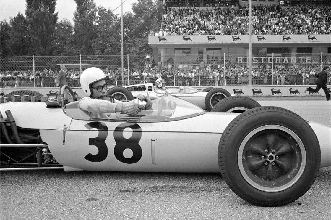 Masten Gregory prepares for the start alongside Innes Ireland Masten Gregory prepares for the start alongside Innes Ireland
