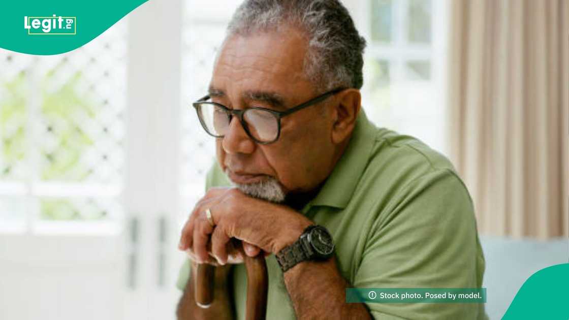 An elderly man sitting alone, symbolising loneliness and isolation. An elderly man sitting alone, symbolising loneliness and isolation.