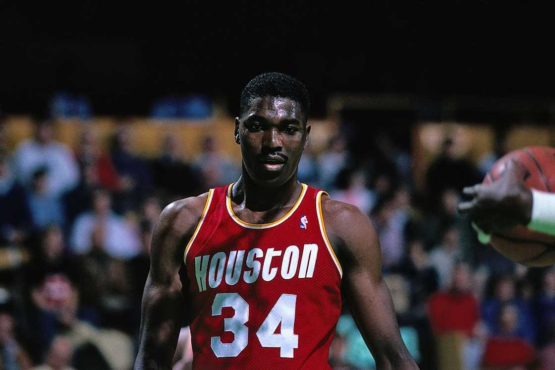 Hakeem Olajuwon looks on against the Boston Celtics during a game