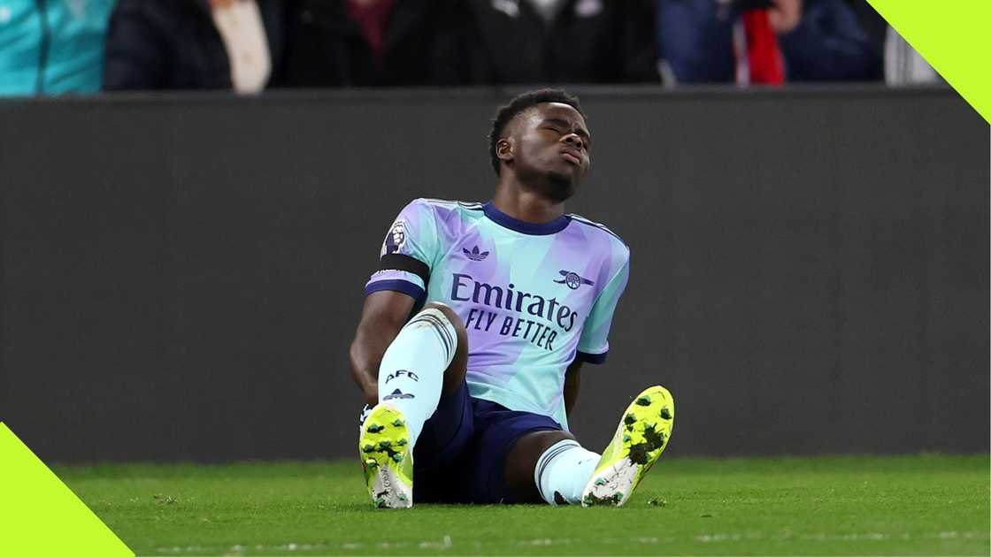Bukayo Saka goes down injured during Arsenal's match against Crystal Palace Bukayo Saka goes down injured during Arsenal's match against Crystal Palace