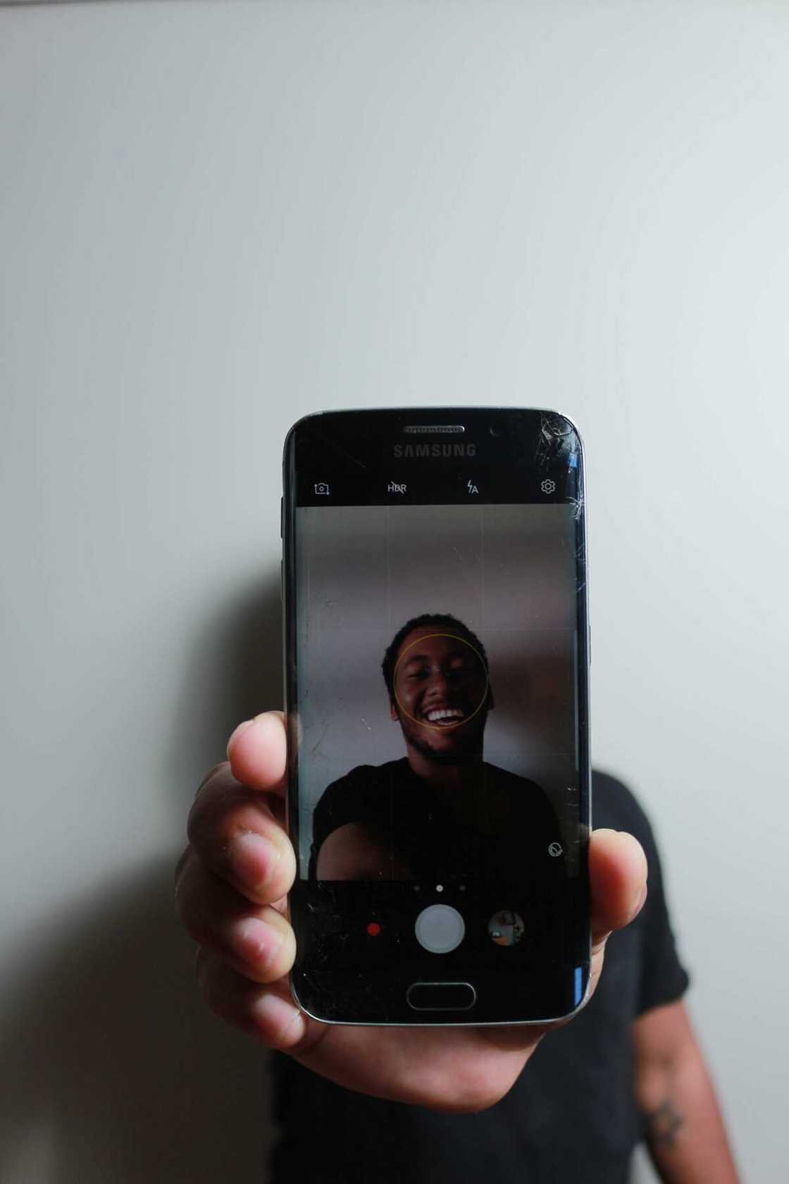 Man taking a photo for the dating site Man taking a photo for the dating site