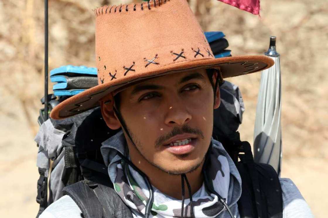 Saudi trekker Abdullah Alsulmi is headed for the World Cup in Qatar -- on foot across the Arabian Peninsula