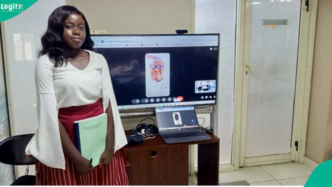 A lady in her 20s celebrates as she bags a PhD from Babcock University