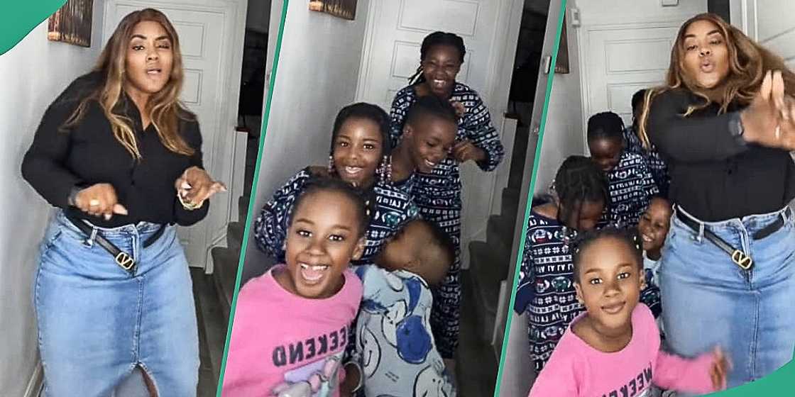 Young-looking mum dances with her five children