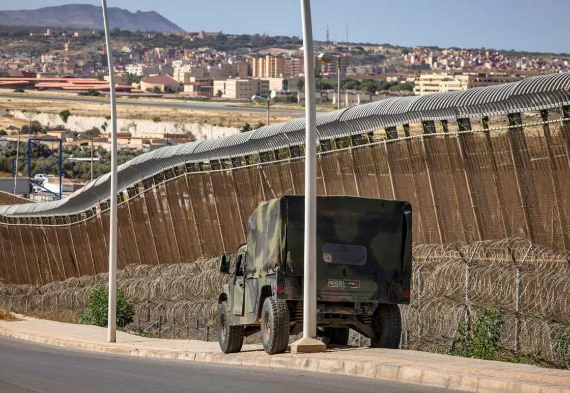 A Moroccan security forces vehicle posted at the border fence separating Morocco from Spain's Melilla enclave A Moroccan security forces vehicle posted at the border fence separating Morocco from Spain's Melilla enclave