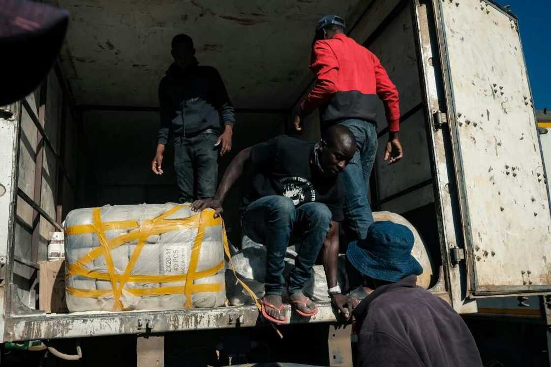 A bus trailer arrives in Harare with groceries sent to Zimbabweans from relatives in South Africa. For many, this food is a lifeline A bus trailer arrives in Harare with groceries sent to Zimbabweans from relatives in South Africa. For many, this food is a lifeline