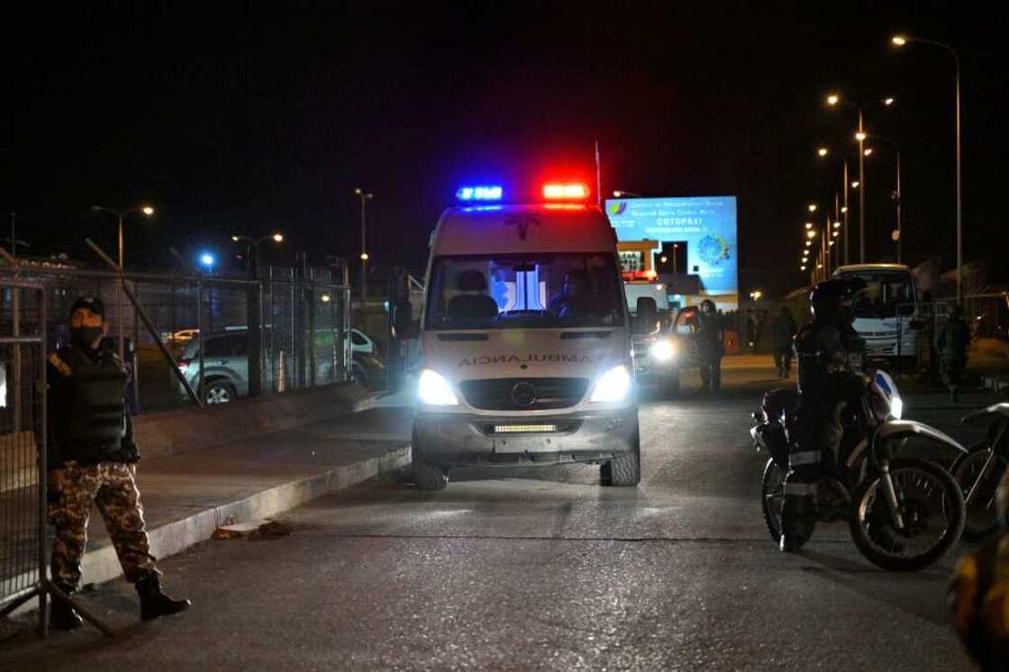 An ambulance leaves the prison, where repeated outbreaks of deadly violence linked to drug trafficking have occurred An ambulance leaves the prison, where repeated outbreaks of deadly violence linked to drug trafficking have occurred