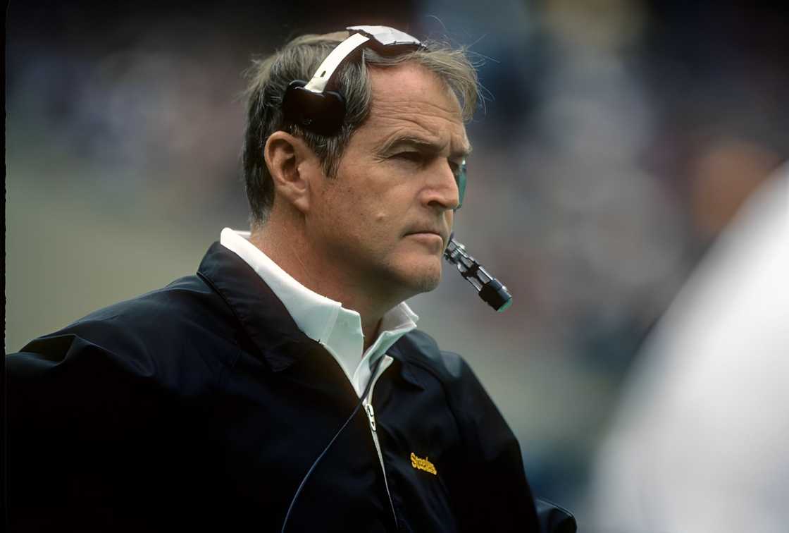 Head Coach Chuck Noll watching the action from the sidelines Head Coach Chuck Noll watching the action from the sidelines