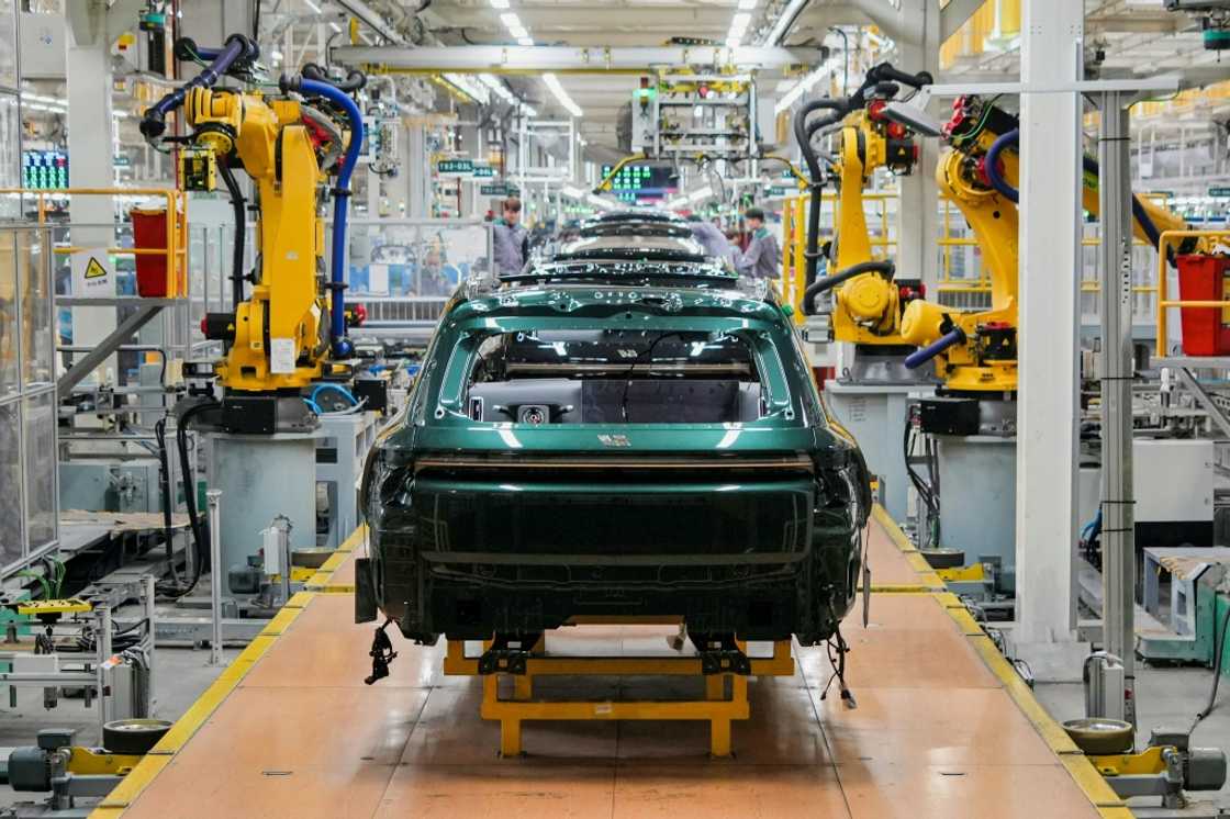 Macron says the EU car industry is particularly vulnerable to Chinese competition