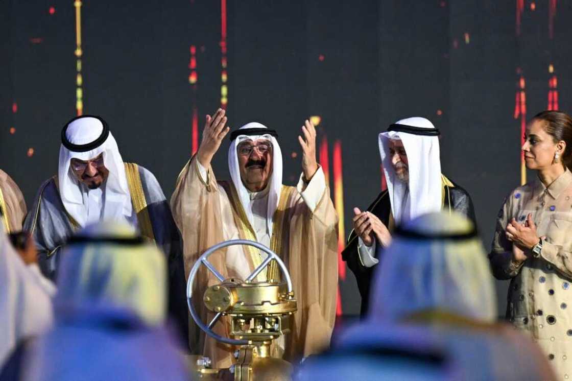 Kuwait's emir, Sheikh Meshal al-Ahmed al-Sabah (C), formally opens Al-Zour oil refinery, one of the biggest in the Middle East