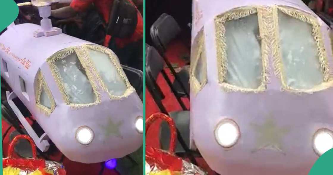 Man buried inside coffin that looks like aeroplane. Man buried inside coffin that looks like aeroplane.