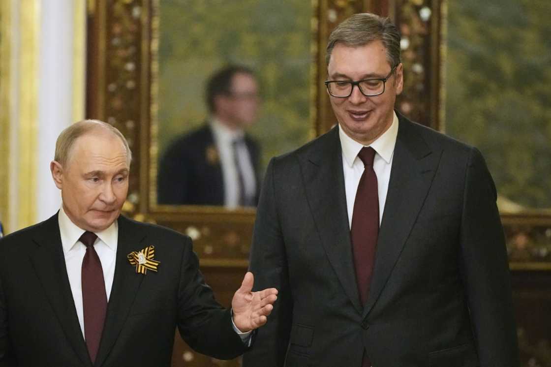Vladimir Putin, left, with Serbia's President Aleksandar Vucic at the Kremlin on Friday Vladimir Putin, left, with Serbia's President Aleksandar Vucic at the Kremlin on Friday