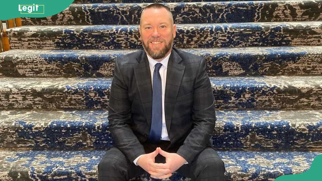 Joe Fleetwood smiles as he poses for a picture