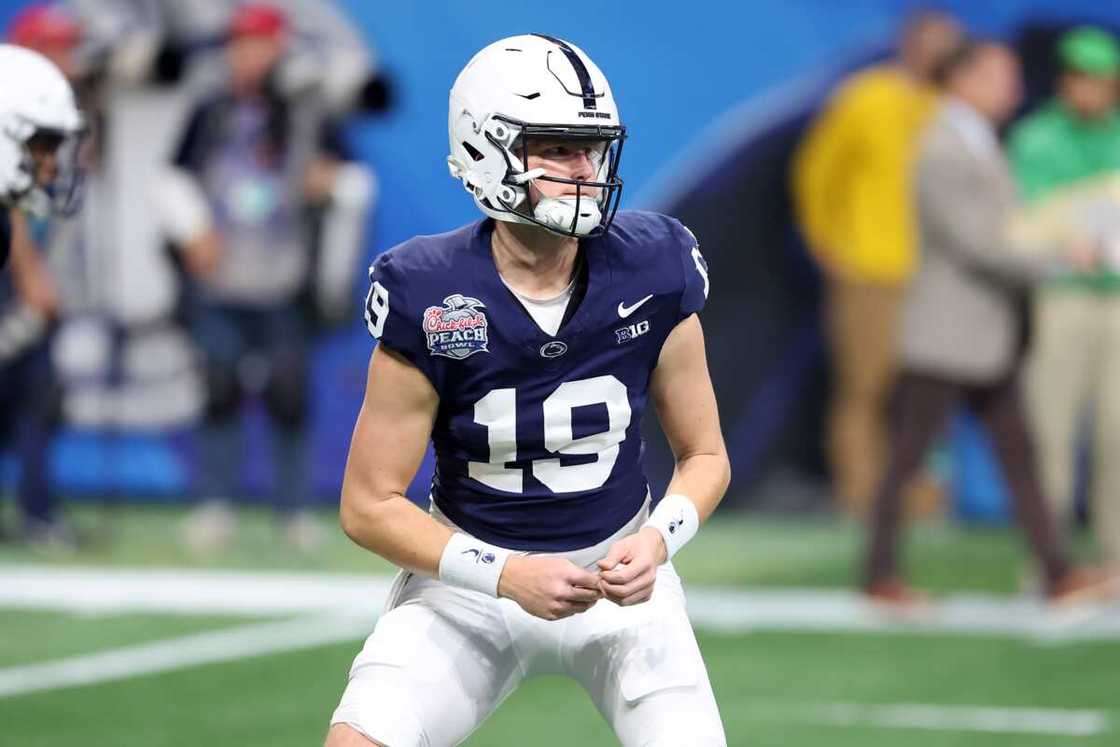 Footballer Jack Lambert holding ball Footballer Jack Lambert holding ball