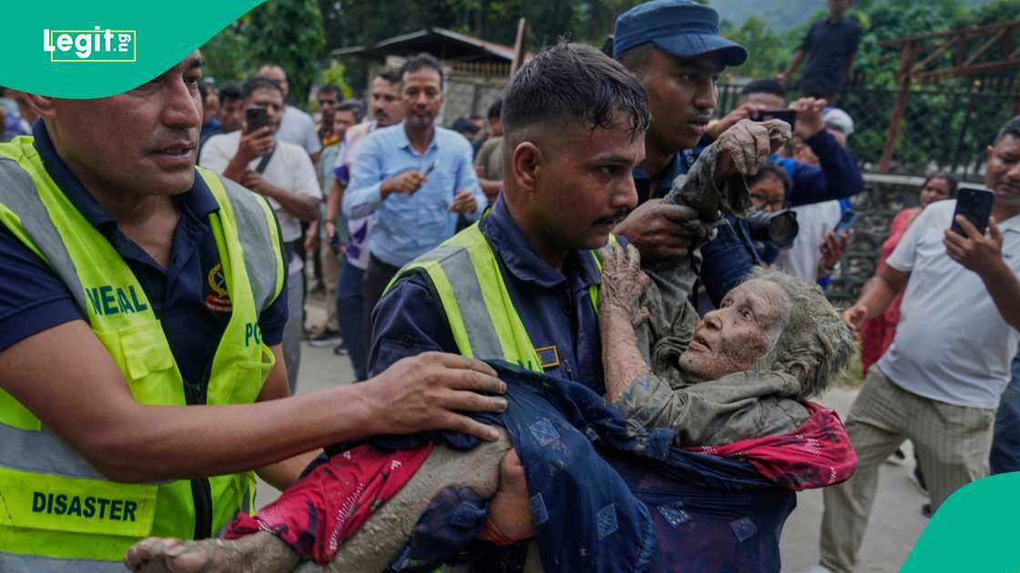 Rescuers carry a victim to safety after flash flooding along the Trishuli River in Nepal’s Nuwakot district on Wednesday, August 26, 2026. Rescuers carry a victim to safety after flash flooding along the Trishuli River in Nepal’s Nuwakot district on Wednesday, August 26, 2026.
