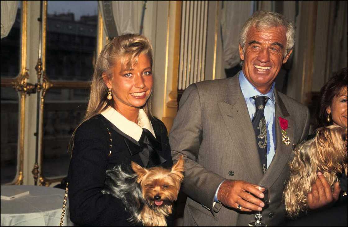 Natty Tardivel et Jean-Paul Belmondo
Photo : Alain BENAINOUS/Gamma-Rapho via Getty Images Natty Tardivel et Jean-Paul Belmondo
Photo : Alain BENAINOUS/Gamma-Rapho via Getty Images