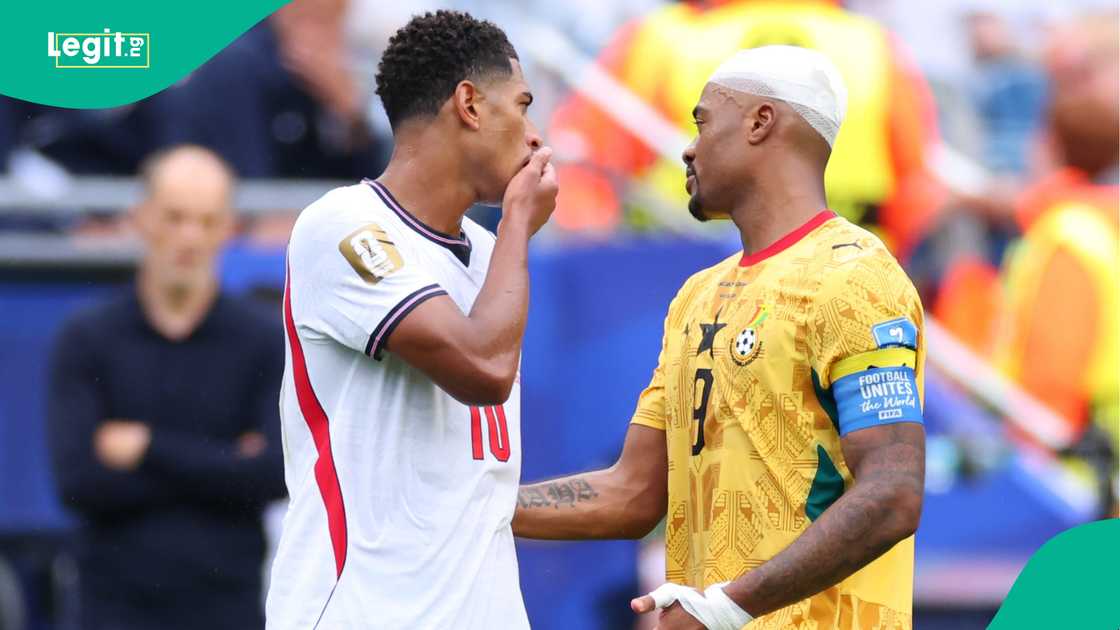 Jude Bellingham of England covers his mouth as he speaks with Jordan Ayew of Ghana during the FIFA World Cup 2026 match. Photo by Marc Atkins Jude Bellingham of England covers his mouth as he speaks with Jordan Ayew of Ghana during the FIFA World Cup 2026 match. Photo by Marc Atkins