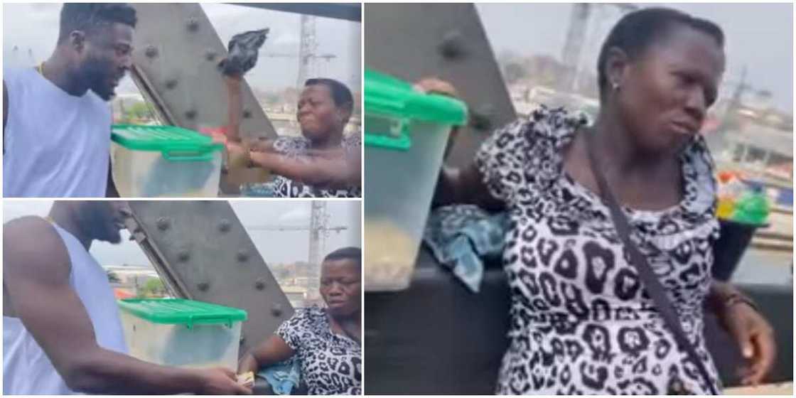 Sweet moment Nigerian man gifting a pregnant bridge hawker N100k melts hearts, video stirs reactions Sweet moment Nigerian man gifting a pregnant bridge hawker N100k melts hearts, video stirs reactions