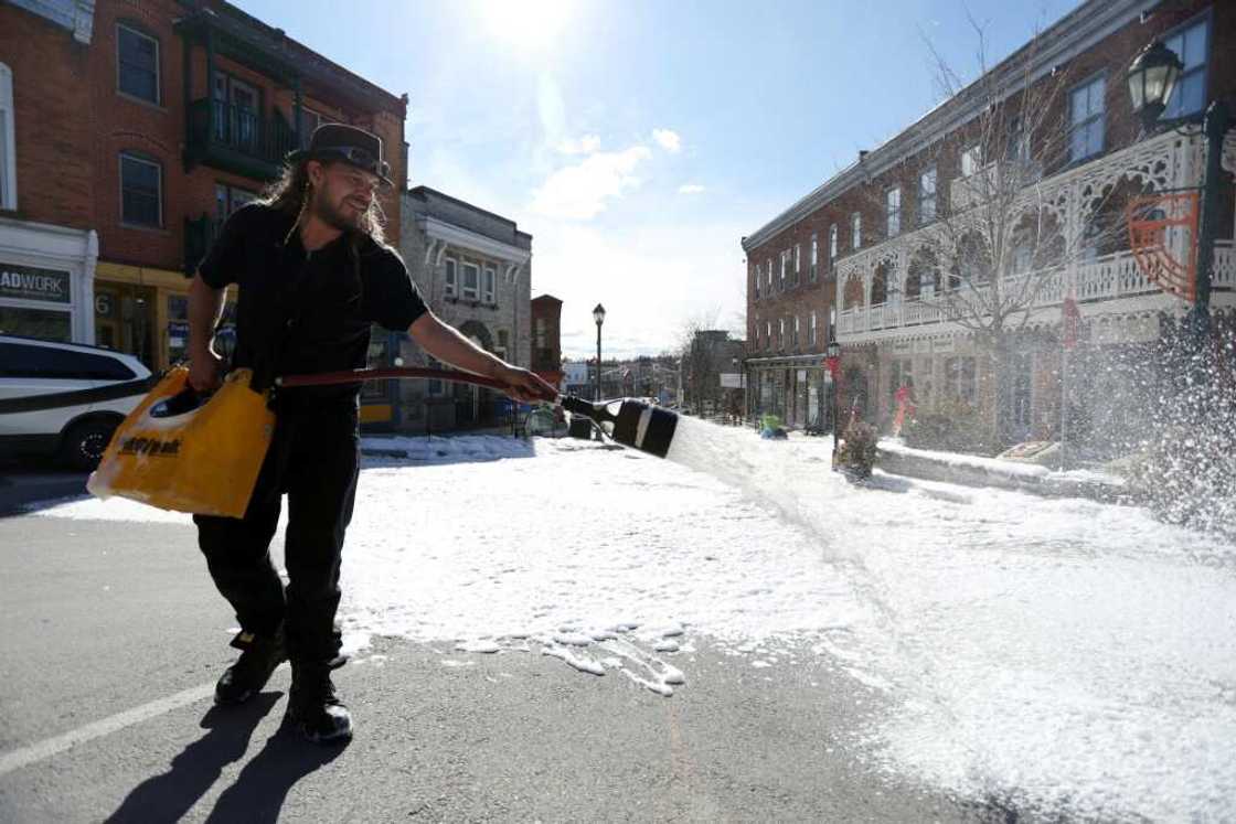 Special effects supervisor Mathieu Bissonnette-Bigras sprays foam to create a winter snow scene -- in April Special effects supervisor Mathieu Bissonnette-Bigras sprays foam to create a winter snow scene -- in April