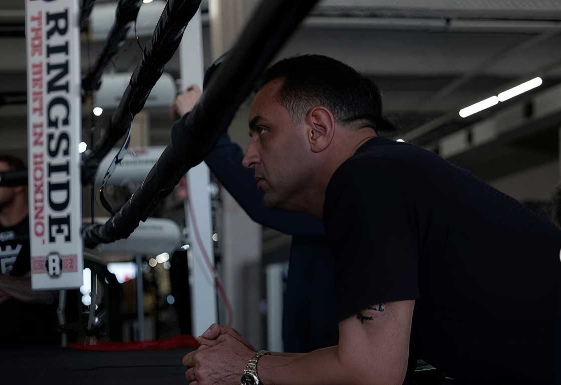 Dino Guilmette seen watching a boxing match outside a boxing ring. Dino Guilmette seen watching a boxing match outside a boxing ring.
