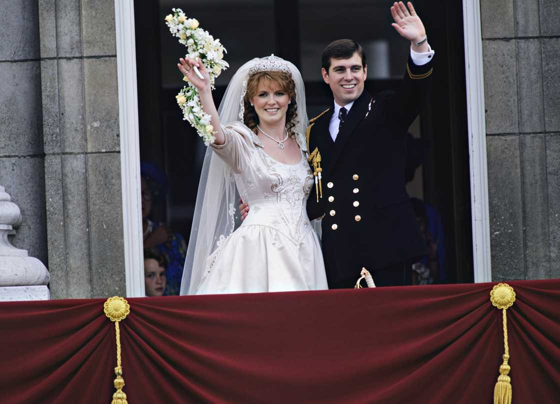 Sarah Ferguson and Andrew Mountbatten-Windsor waving to the crowds