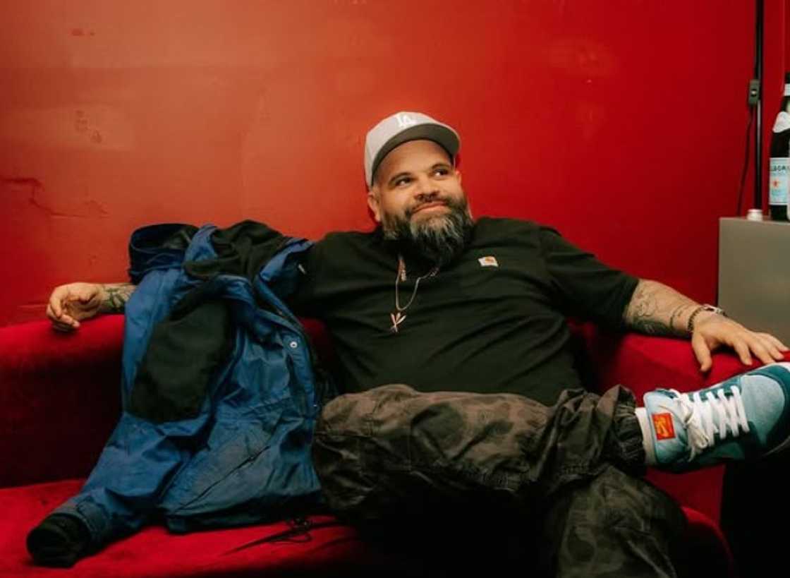 Senator Briggs seated on a couch Senator Briggs seated on a couch