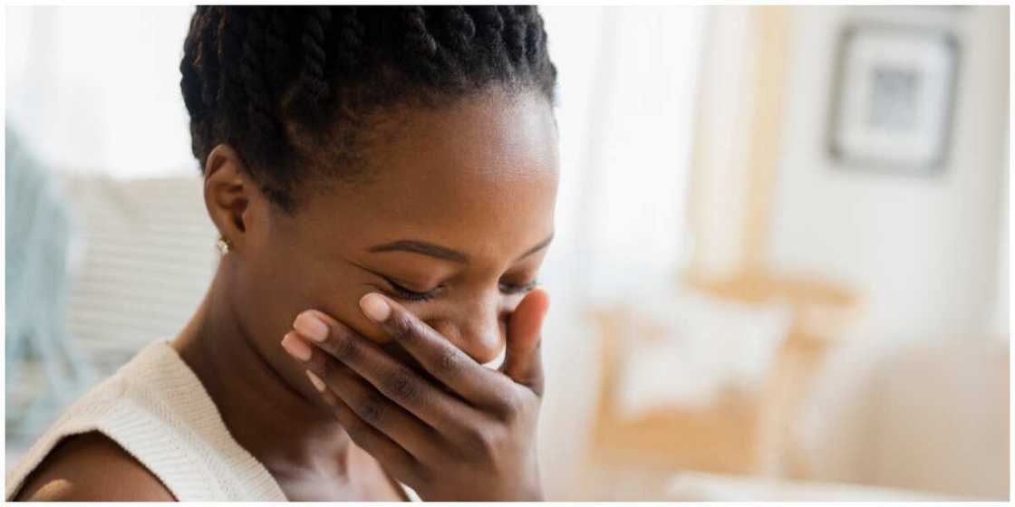 Photo of a lady laughing.