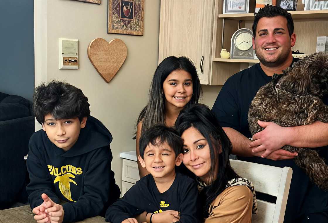Snooki, Jionni, their three kids, and dog
