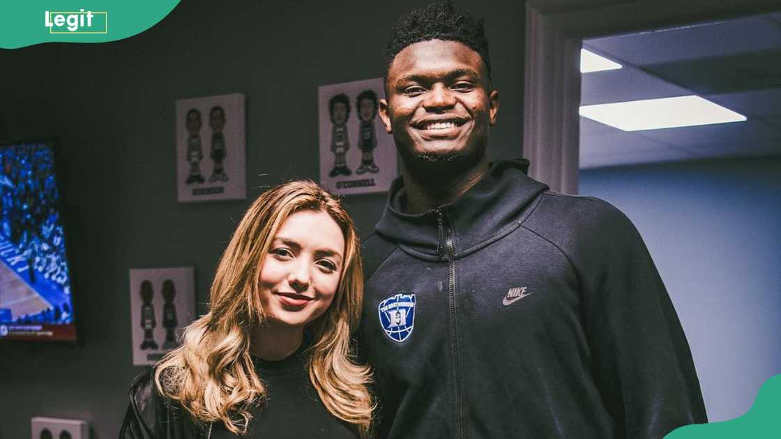 Peyton List and Zion Williamson standing close together Peyton List and Zion Williamson standing close together