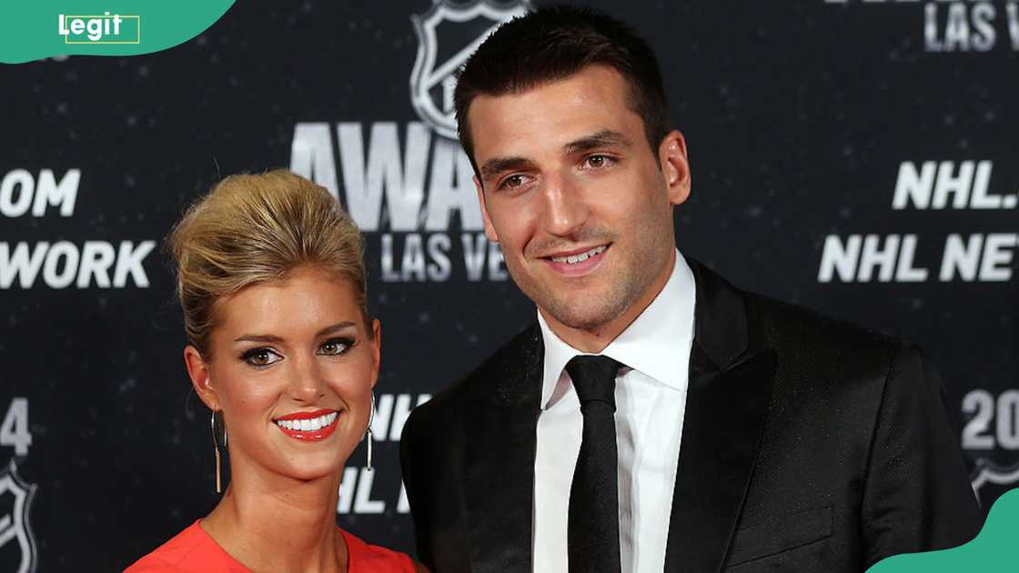 Stefanie Bertrand and Patrice Bergeron pose at the 2014 NHL Awards at Encore Las Vegas Stefanie Bertrand and Patrice Bergeron pose at the 2014 NHL Awards at Encore Las Vegas