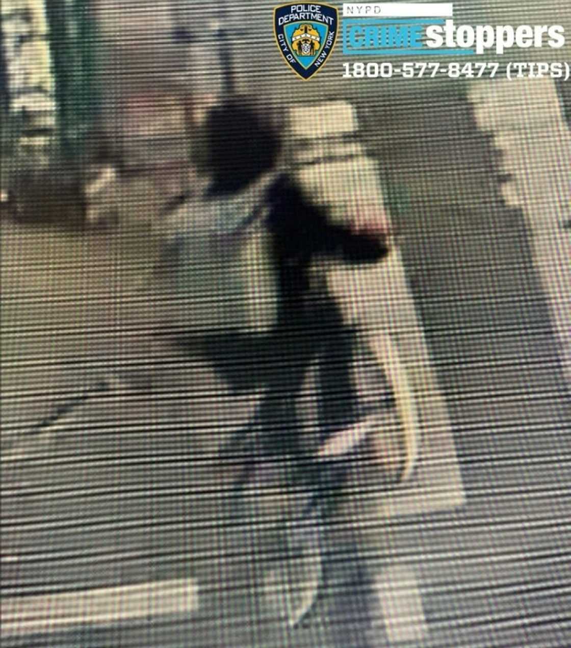 The suspect then fled the scene on foot before getting on a bike, which appeared to be part of New York's fleet of rentable Citibikes The suspect then fled the scene on foot before getting on a bike, which appeared to be part of New York's fleet of rentable Citibikes