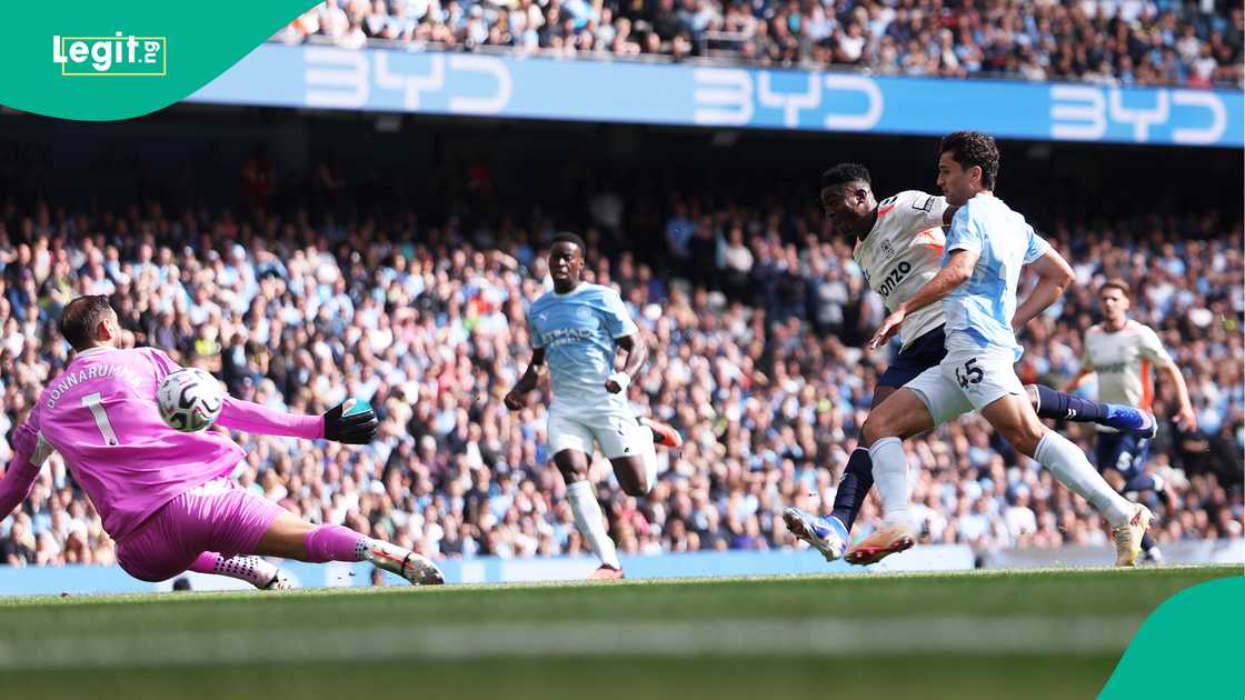 Taiwo Awoniyi, Gianluigi Donnarumma, Manchester City, Coventry City, England.