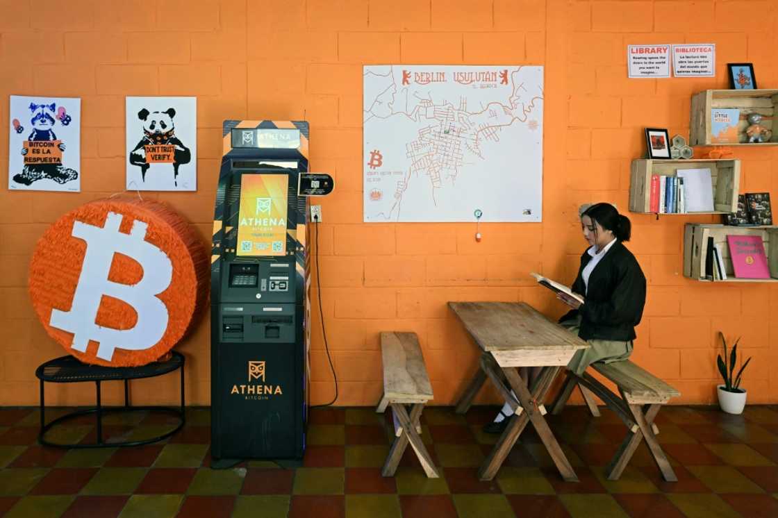 A student reads a book at the bitcoin community center in the mountain town of Berlin in El Salvador