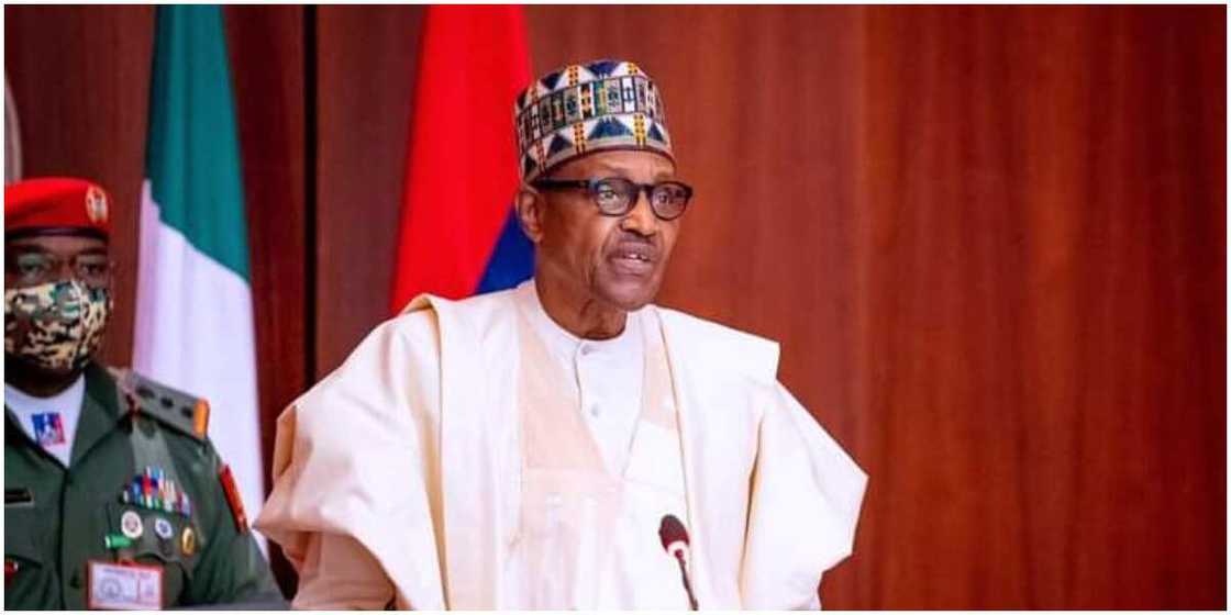 Nigeria's President, Muhammadu Buhari, standing in front of his guard. Nigeria's President, Muhammadu Buhari, standing in front of his guard.