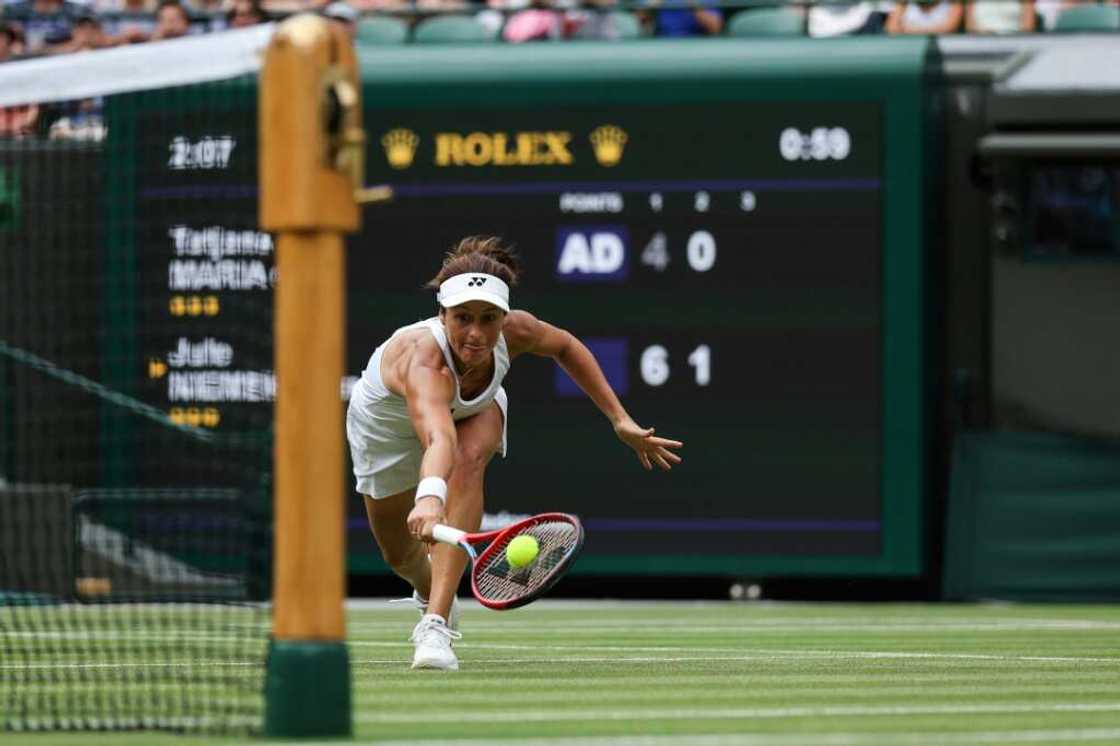 Germany's Tatjana Maria in action against compatriot Jule Niemeier in the Wimbledon quarter-finals Germany's Tatjana Maria in action against compatriot Jule Niemeier in the Wimbledon quarter-finals
