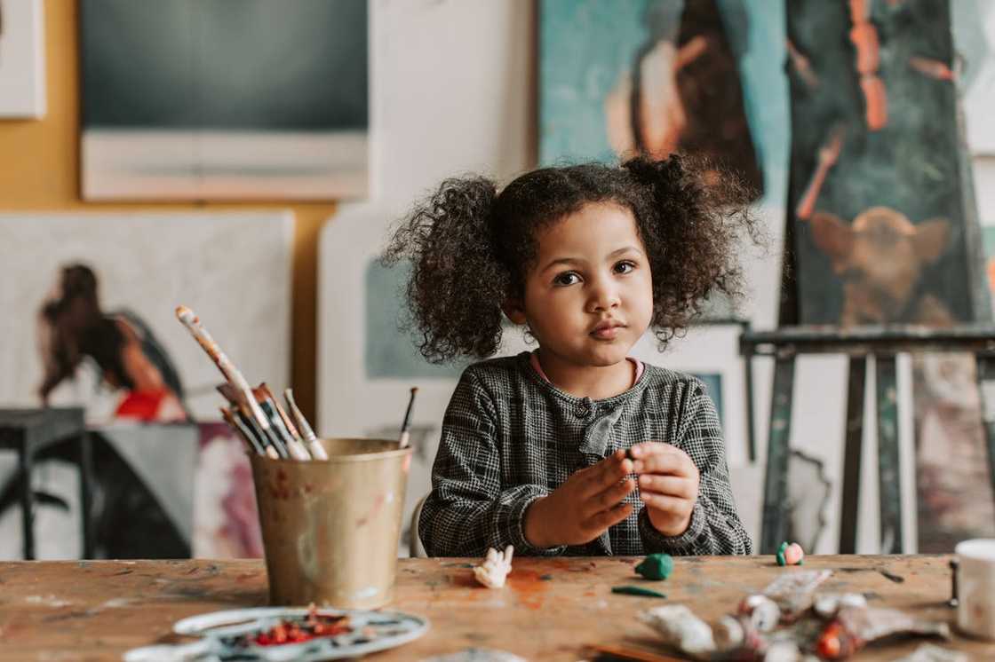 A child stares directly ahead. A child stares directly ahead.