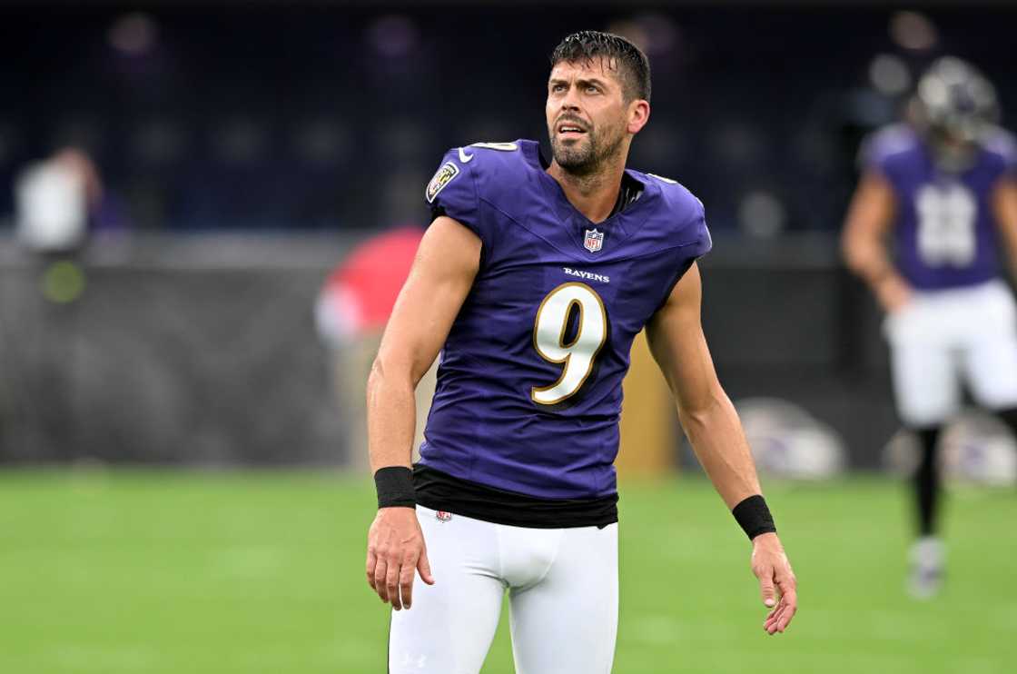 Justin Tucker warms up before a game in Baltimore, Maryland