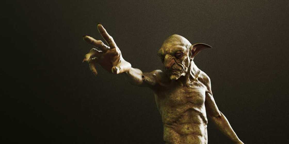 A goblin creature stretching his hand