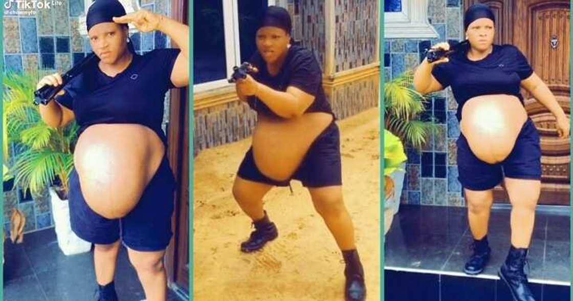 Agile pregnant woman shows off huge baby bump Agile pregnant woman shows off huge baby bump