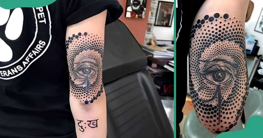 Spiral Eye of Horus tattoo on the arm